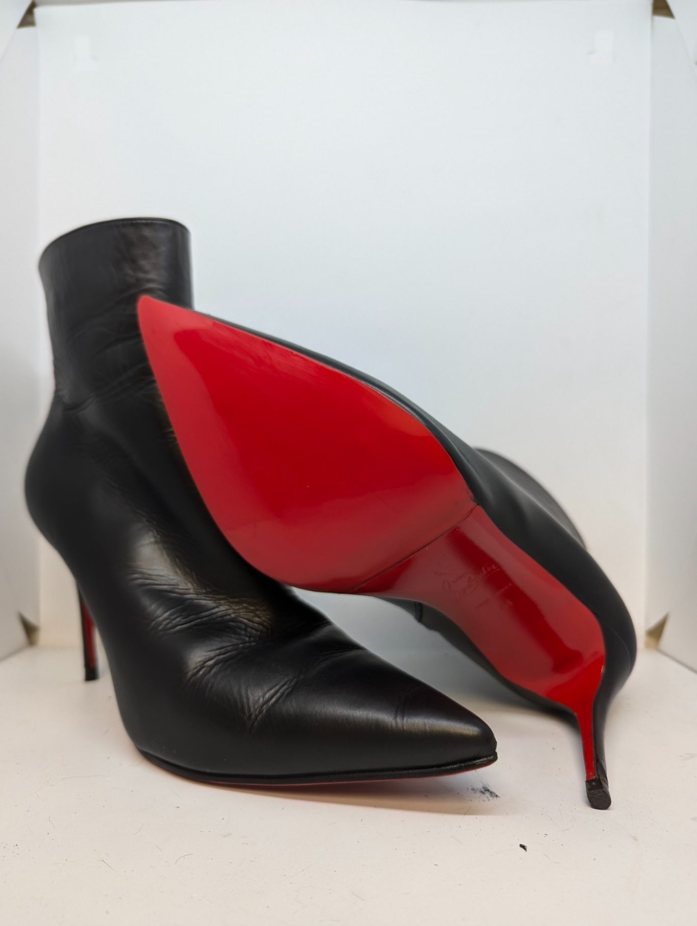 Louboutin rode zool